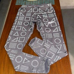 Rare NWOT Nike Dri-Fit reflective running leggings